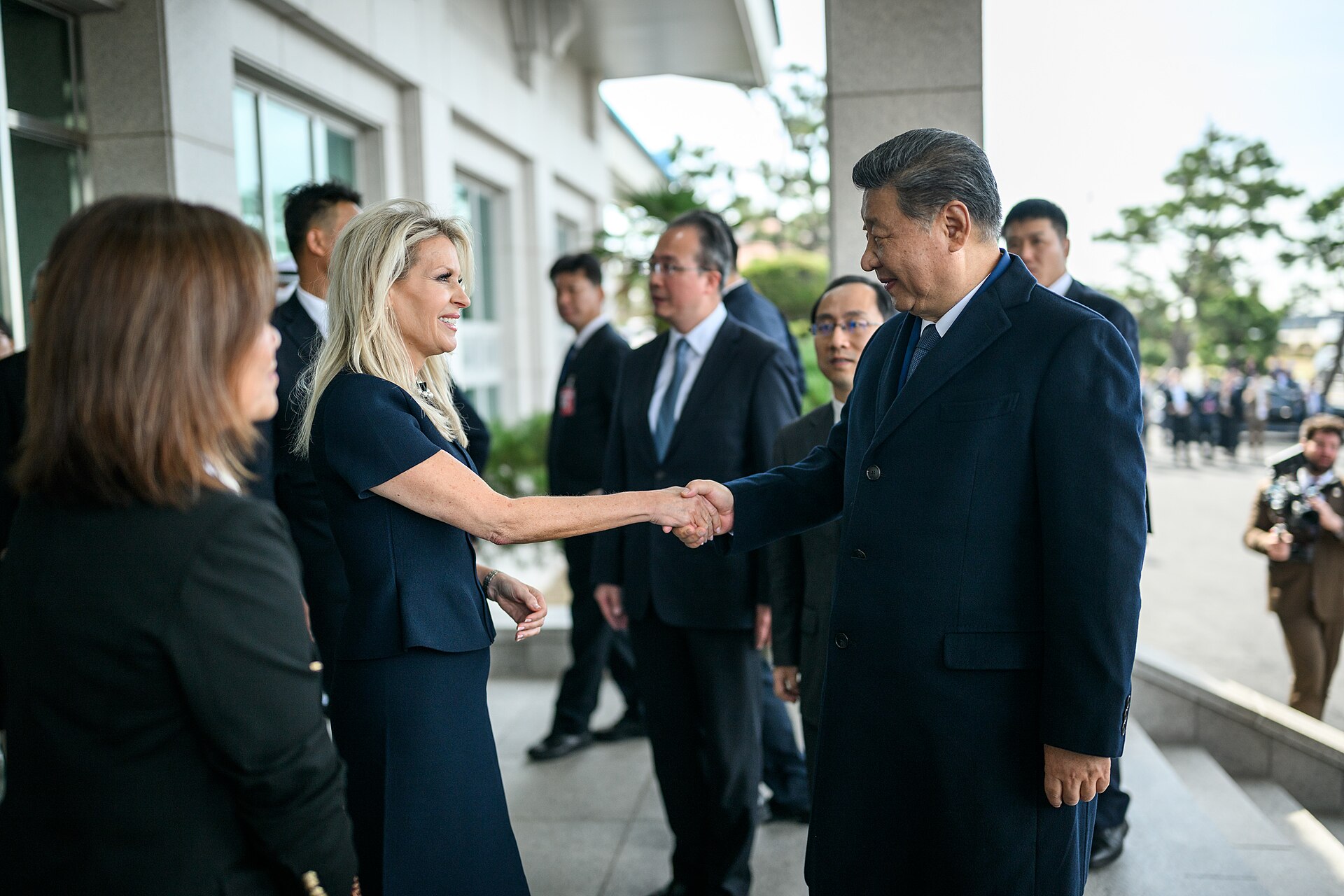 Chinese President Xi Jinping is greeted y Chief of Protocol Monica Crowley for a bilateral meeting with President Donald Trump at the Gimhae International Airport terminal (54890444486)